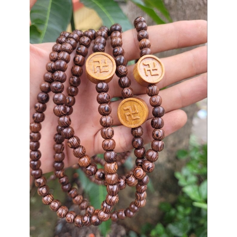 Vòng tay nữ hạt 6 ly chuỗi hạt 108 gỗ vân đẹp muồng hương mun đuôi công mix charm chữ vạn sự như ý màu trầm