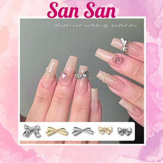 Charm nơ hợp kim vàng bạc đính móng