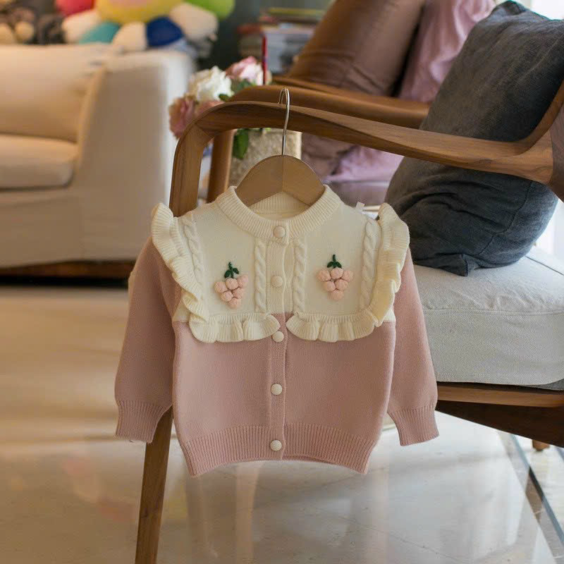 áo khoác cardigan len màu hồng phối bèo cho bé