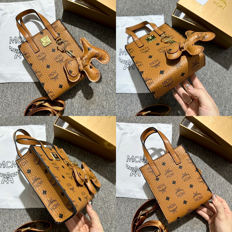 Túi M.CC.M dáng đứng size 17cm kèm hộp móc treo dây vải bản to đeo chéo