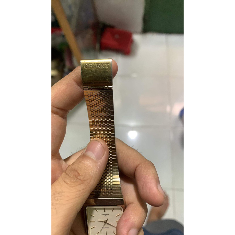 Đồng hồ tank Orient VX bọc vàng hơi phai