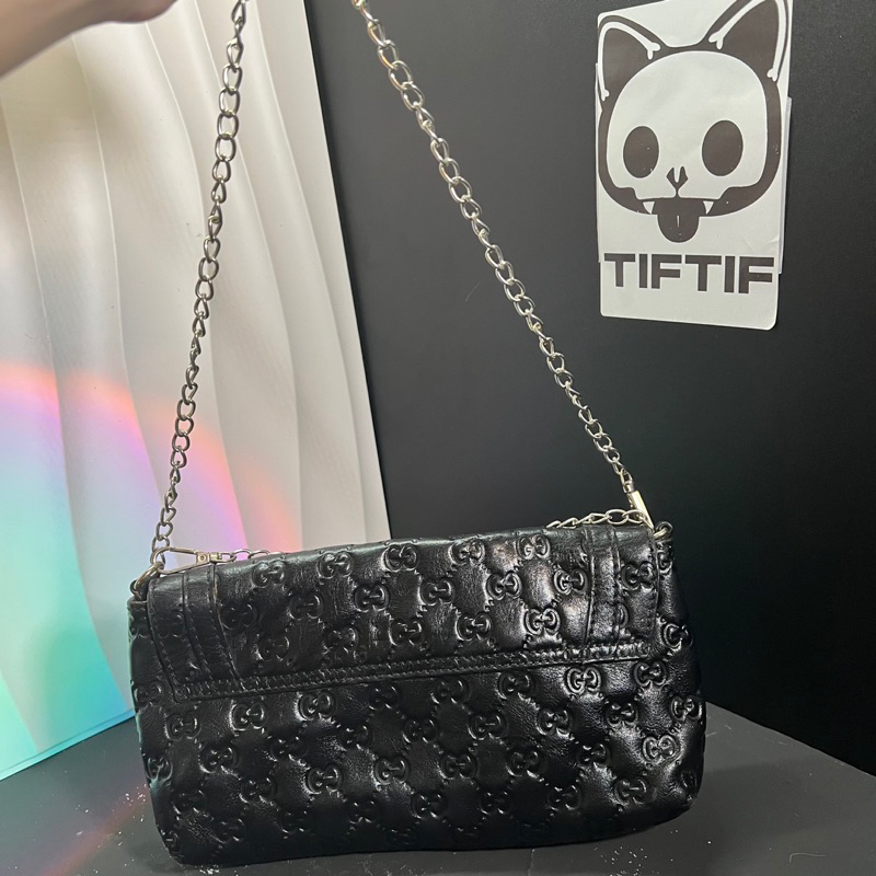 Túi si nhật Gu chì da thật