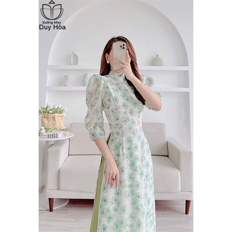 Áo dài hoa nhí màu xanh cách tân 4 tà tay bồng cổ hai phần duyên dáng thướt tha ,mịn màng- HN008