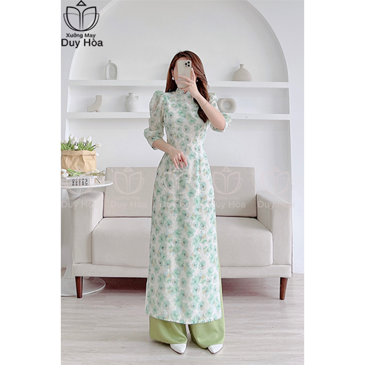 Áo dài hoa nhí màu xanh cách tân 4 tà tay bồng cổ hai phần duyên dáng thướt tha ,mịn màng- HN008