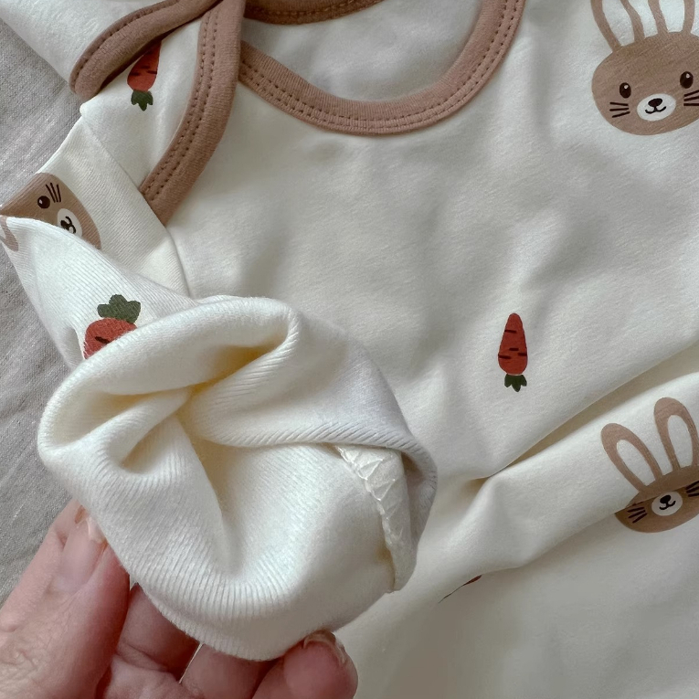 Bodysuit Liền Thân Kèm Mũ Tai Thỏ Dễ Thương Cho Bé Chất Liệu Mềm Mại Size 0-9M