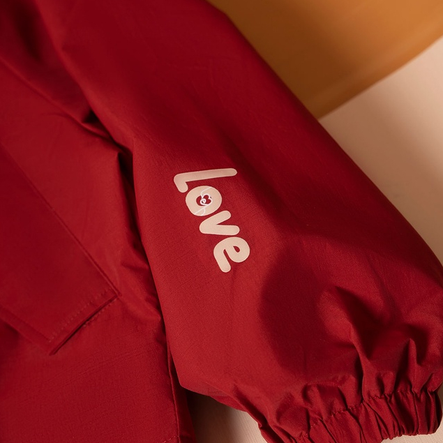 Áo Khoác Gió LeH Mũ Liền Tay Cánh Dơi Bo Tay In Chữ H65I21T008