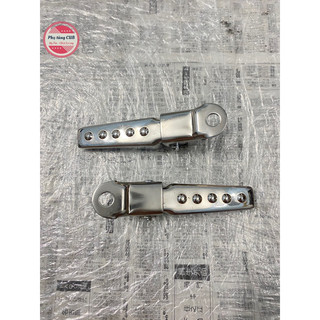 Gác chân sau xe cub gắn vào phuộc sau chất liệu inox