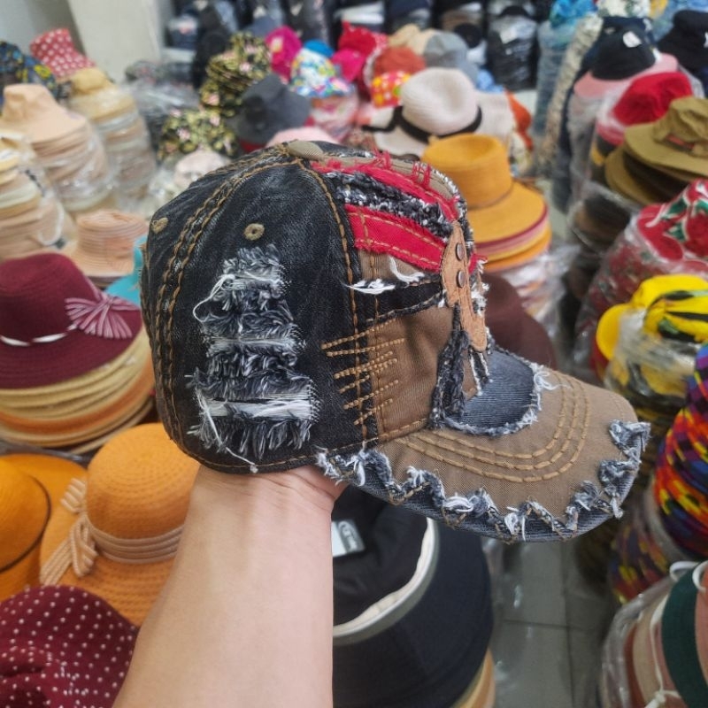 Nón kết jean tua địa