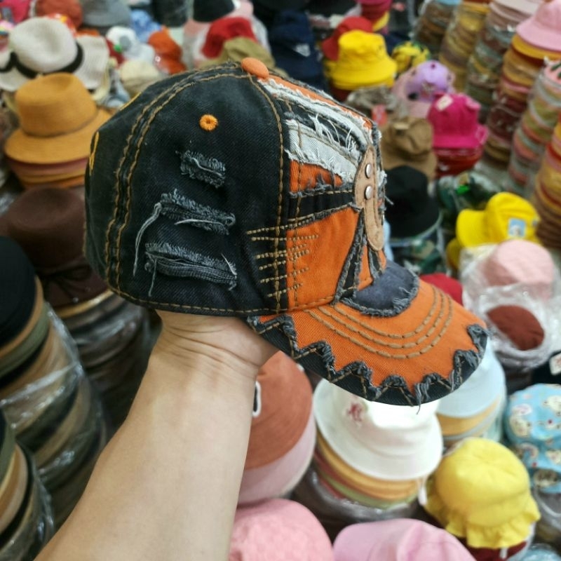 Nón kết jean tua địa