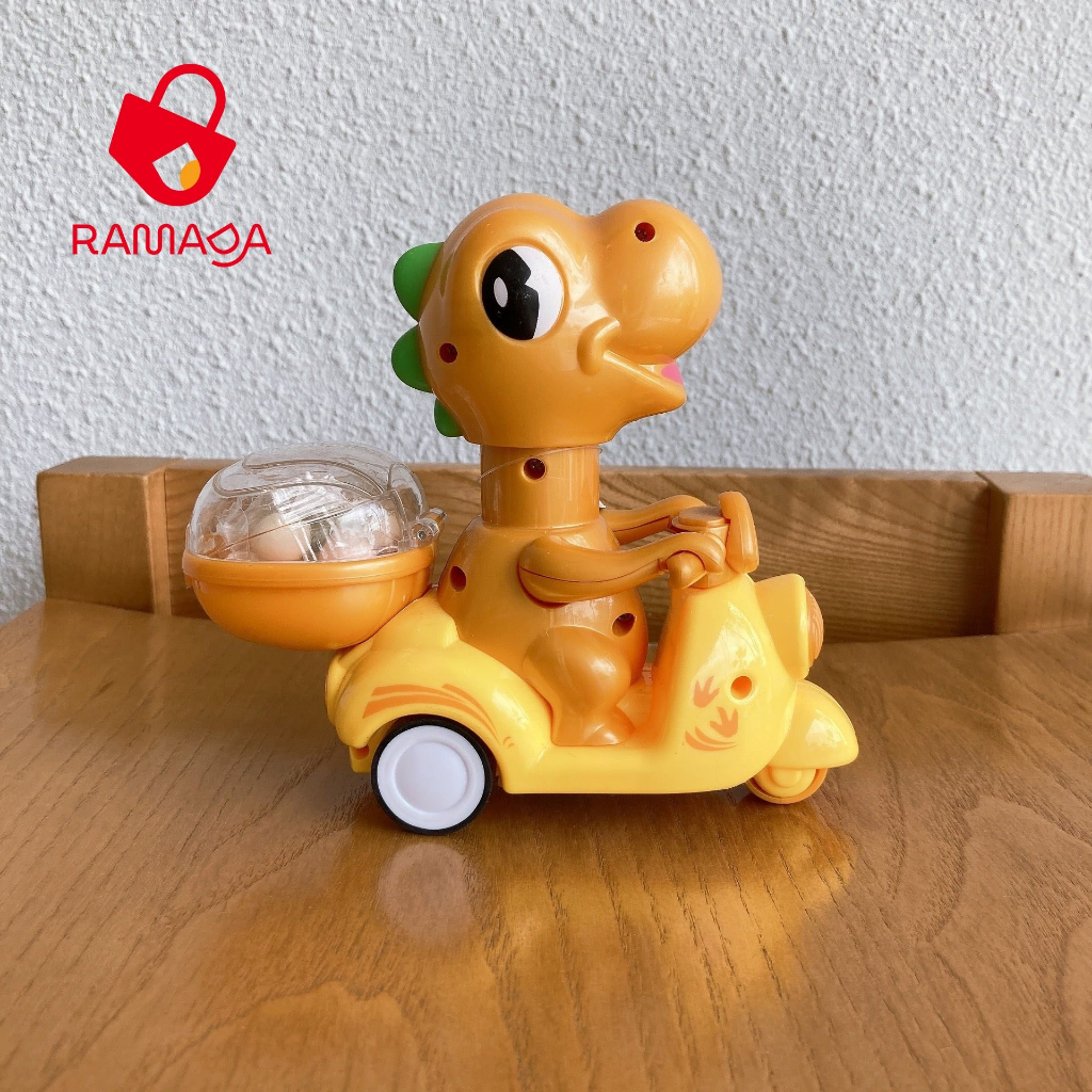 Kẹo đồ chơi khủng long cưỡi xe máy cute Juqi dành cho bé