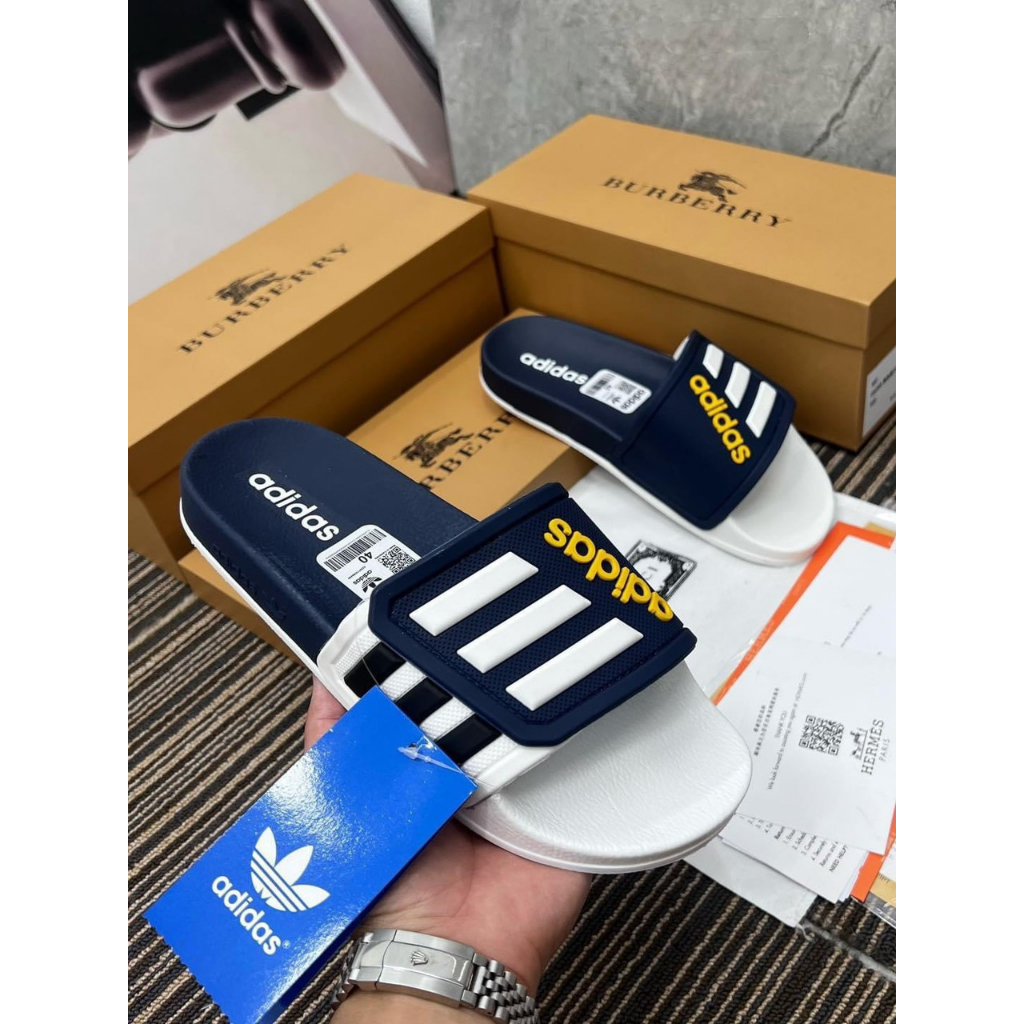 Dép adidas quai khâu mẫu mới 3 sọc 2 màu đen vàng - new 2023