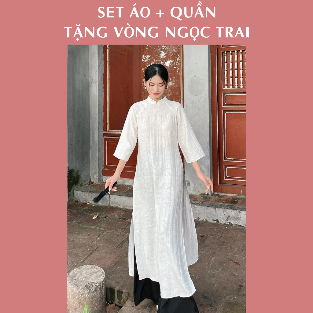Áo dài Bích Lý, dáng xuông rộng, không chiết li, lụa gấm cao câp . Tặng vòng ngọc trai