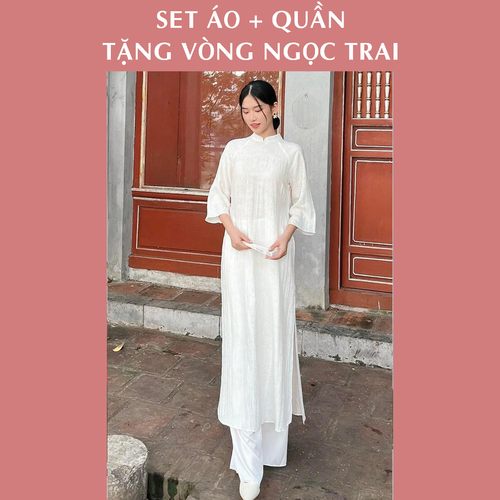Áo dài Bích Lý, dáng xuông rộng, không chiết li, lụa gấm cao câp . Tặng vòng ngọc trai