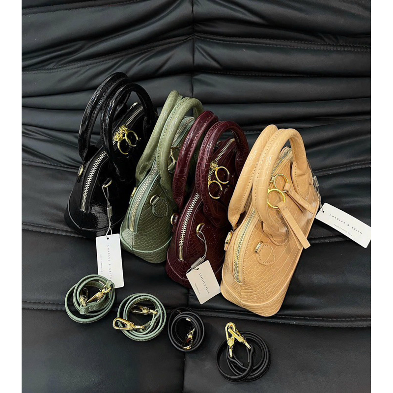 Túi charles keith dáng hến nữ