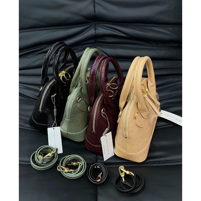Túi charles keith dáng hến nữ