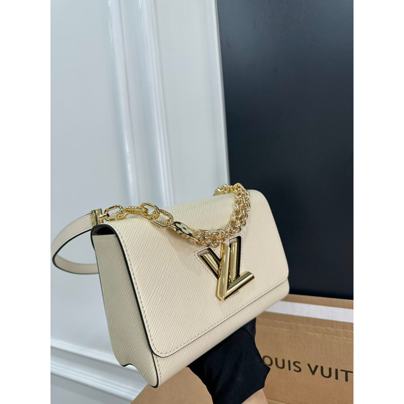 Túi Eovi Twist charm da tăm đỉnh cao full2box size 24cm tag vàng charm xinh W266-24