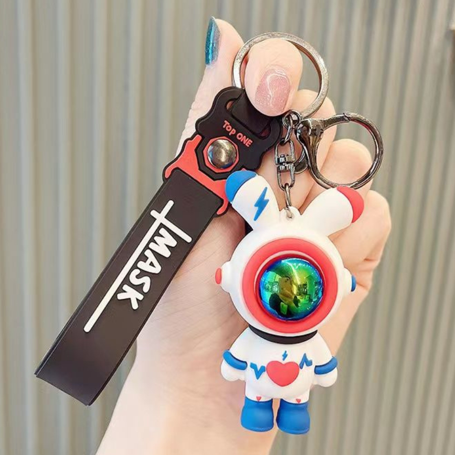 Móc khóa phi hành gia móc khóa xe máy ô tô kèm dây cao su móc cài balo túi sách hoạt hình dễ thương hot trend