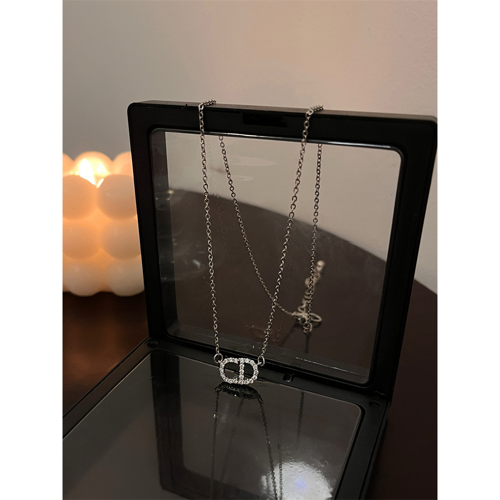 Dây chuyền chữ cái  màu bạc DC156