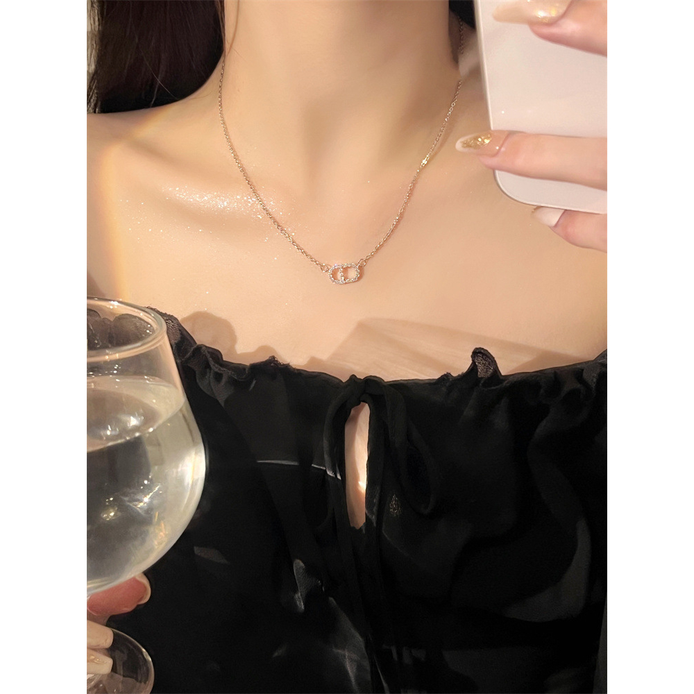 Dây chuyền chữ cái  màu bạc DC156