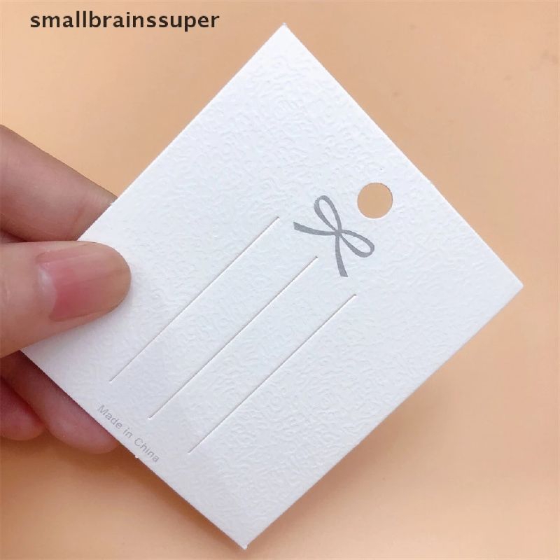 Set 50 thẻ giấy hình nơ trưng bày kẹp tóc màu trắng