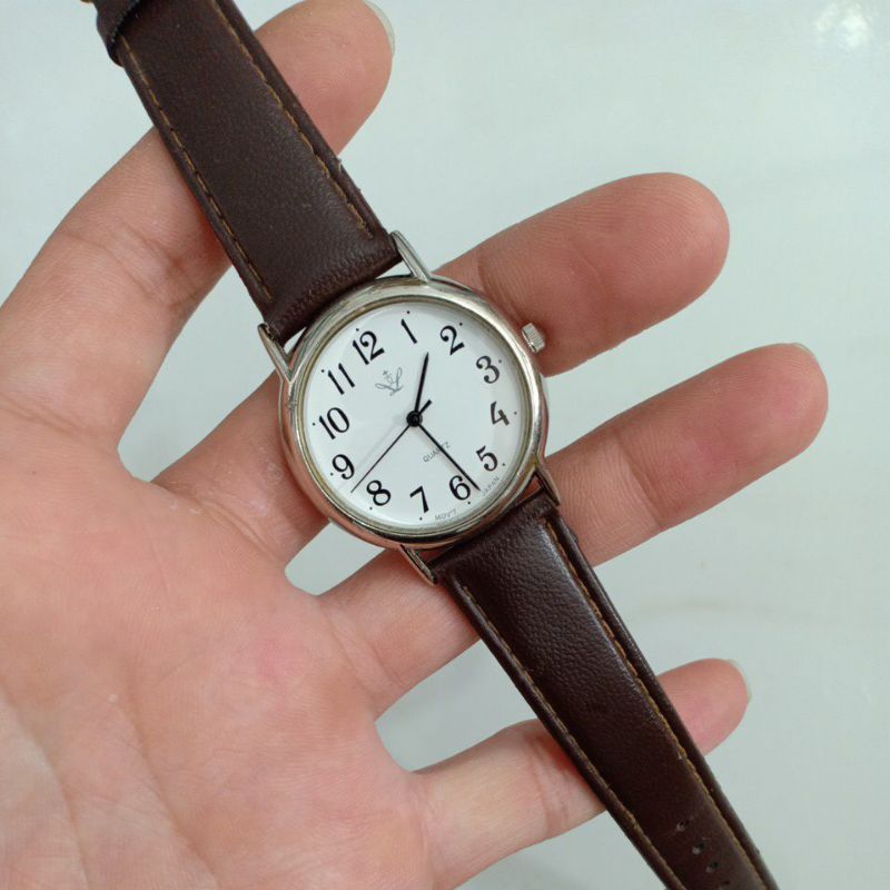 Đồng hồ si nhật nam dây da hiệu QUARTZ