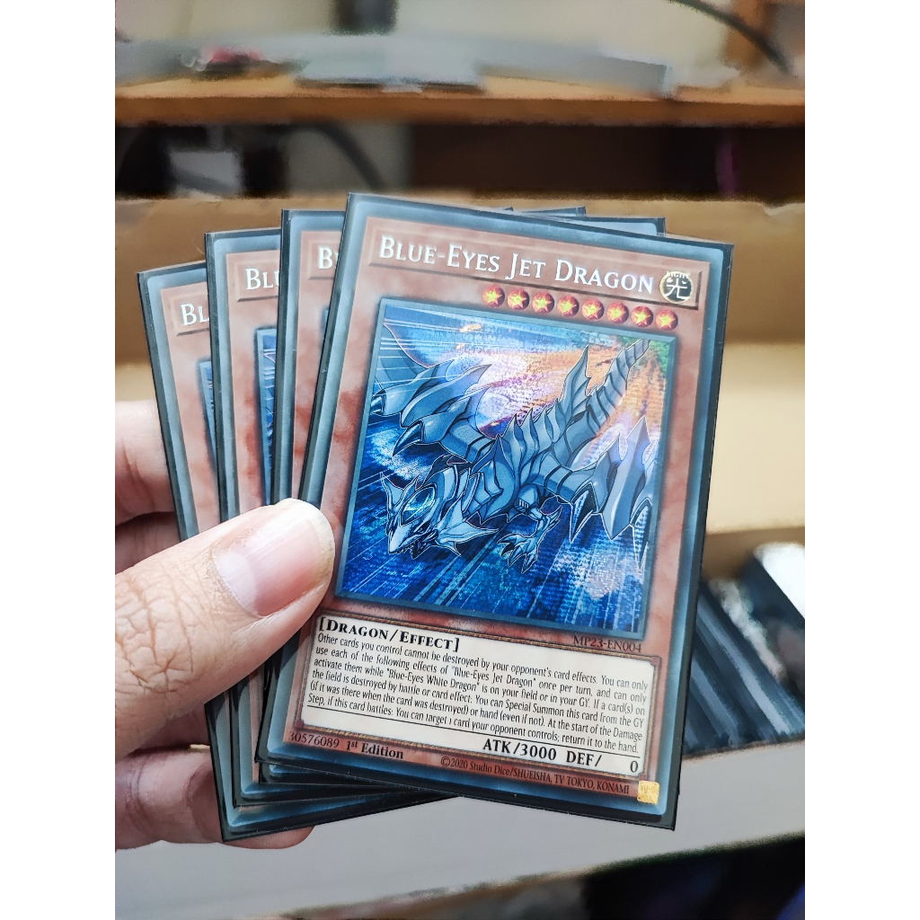1 lá thẻ bài Blue-Eyes Jet Dragon - MP23-EN004 - Prismatic Secret Rare 1st Edition