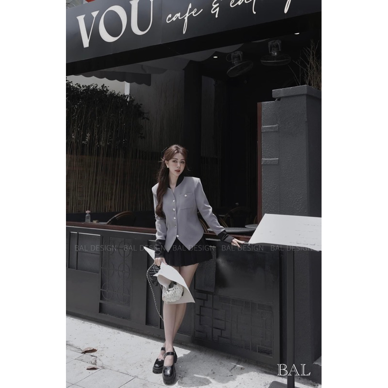 Set Áo Vest Cổ Tàu Phối Chân Váy Xếp Ly