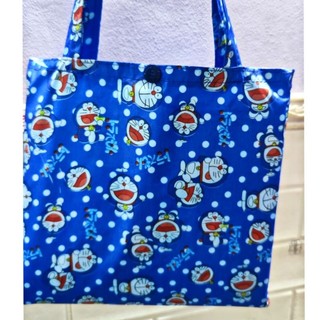 Áo mưa bít vải dù doraemon,picachu,hình thú dễ thương