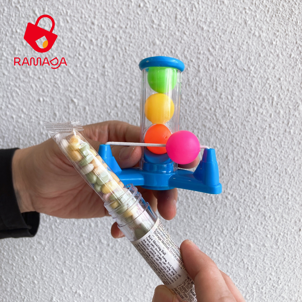 Đồ chơi ná bắn bi có kẹo Juqi dành cho bé