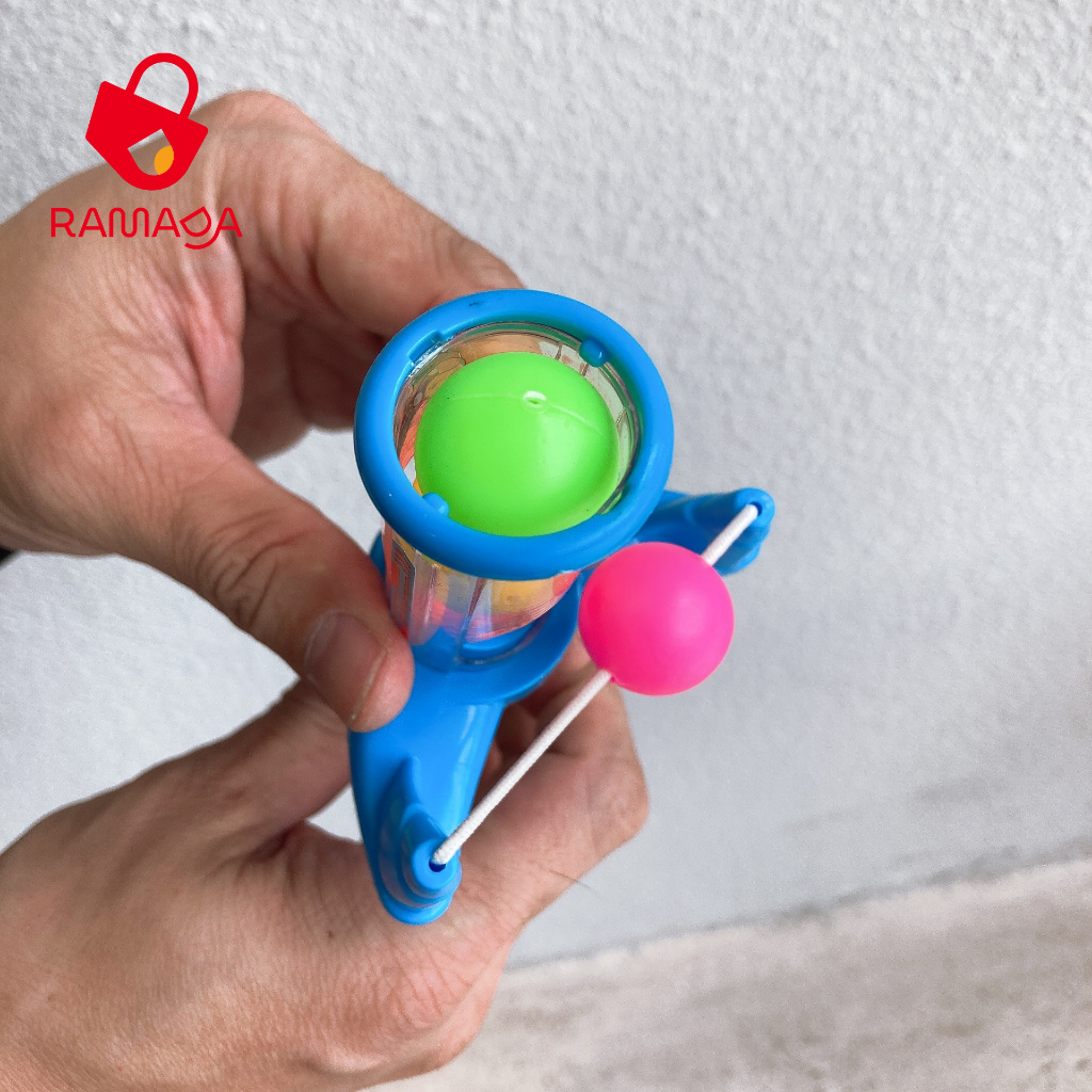 Đồ chơi ná bắn bi có kẹo Juqi dành cho bé