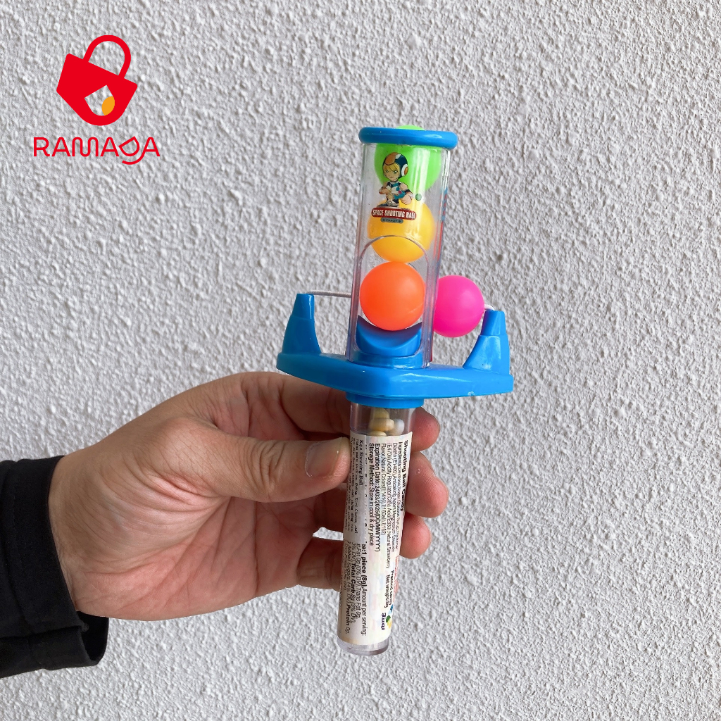 Đồ chơi ná bắn bi có kẹo Juqi dành cho bé