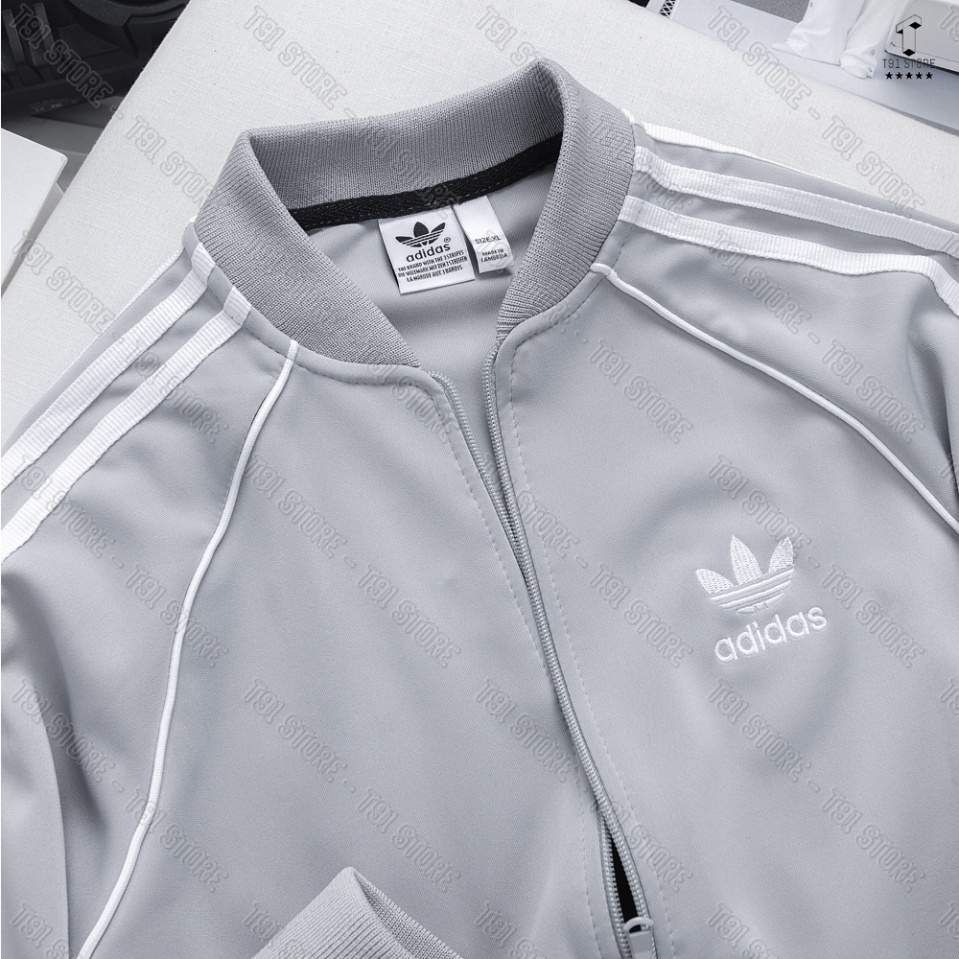 Áo Khoác Bomber Adidas Thể Thao Nam Nữ Vải Thun Nỉ Dày Co Giãn Khóa Chống Gió - Áo Khoác 3 Sọc Kẻ Trắng Cao Cấp