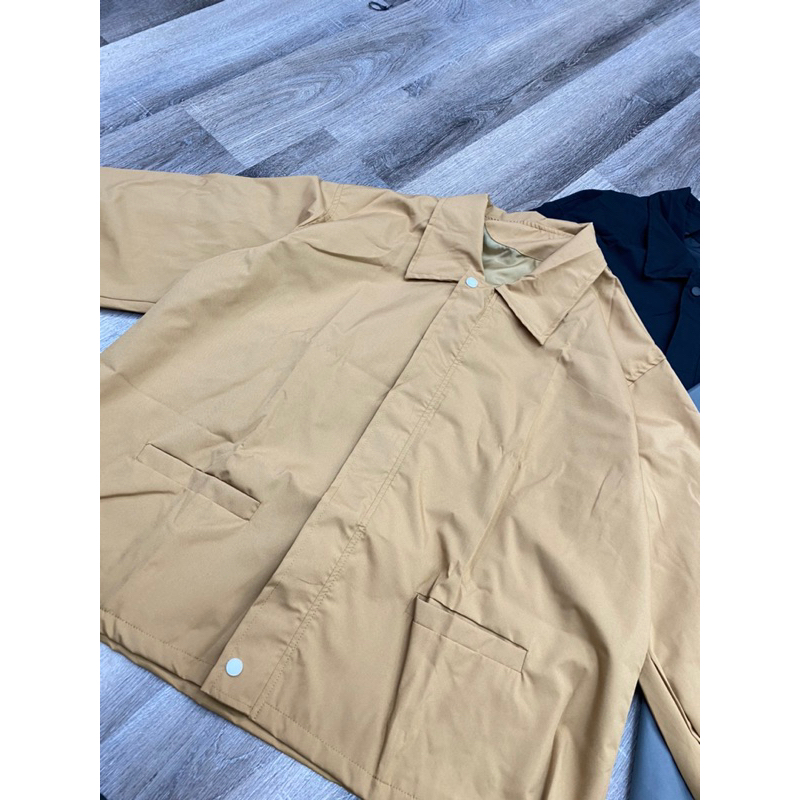 Áo gió tay bo cổ bẻ