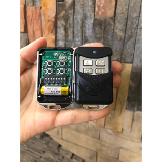 Điều Khiển Cửa Cuốn Inox Xịn Tần số 433 mhz mã gạt 8 số - Remote Cửa Cuốn Sẵn Pin