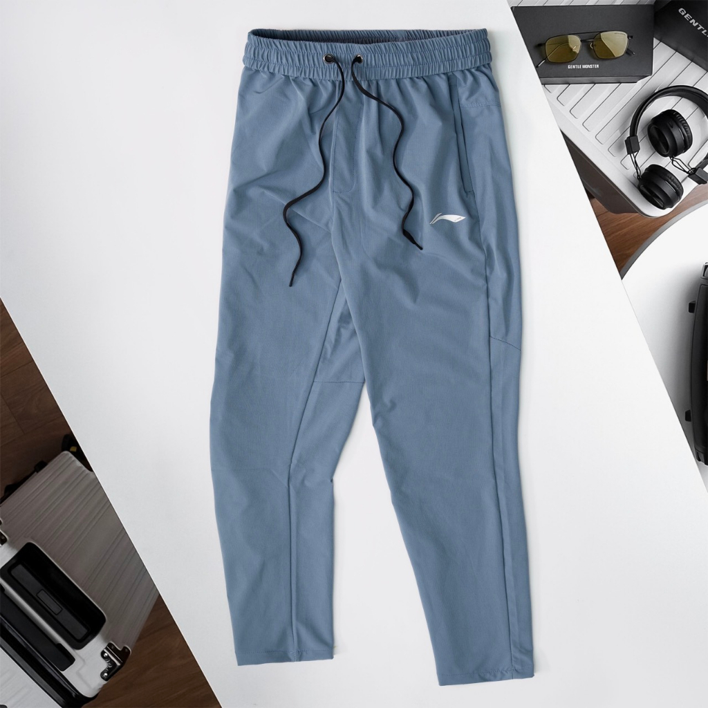 Quần gió nam lining, quần gió thể thao nam cao cấp chất liệu gió sần