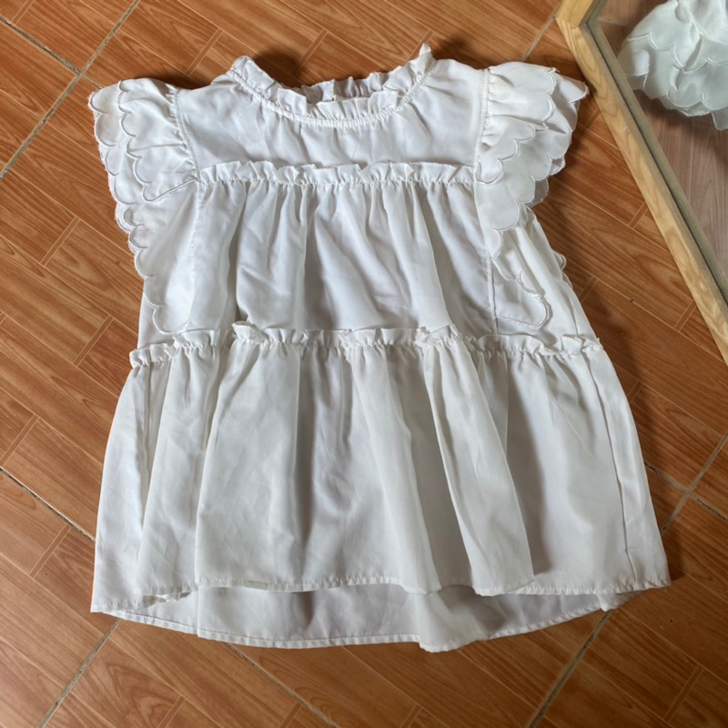 Áo baby doll trắng xoè tay cánh tiên