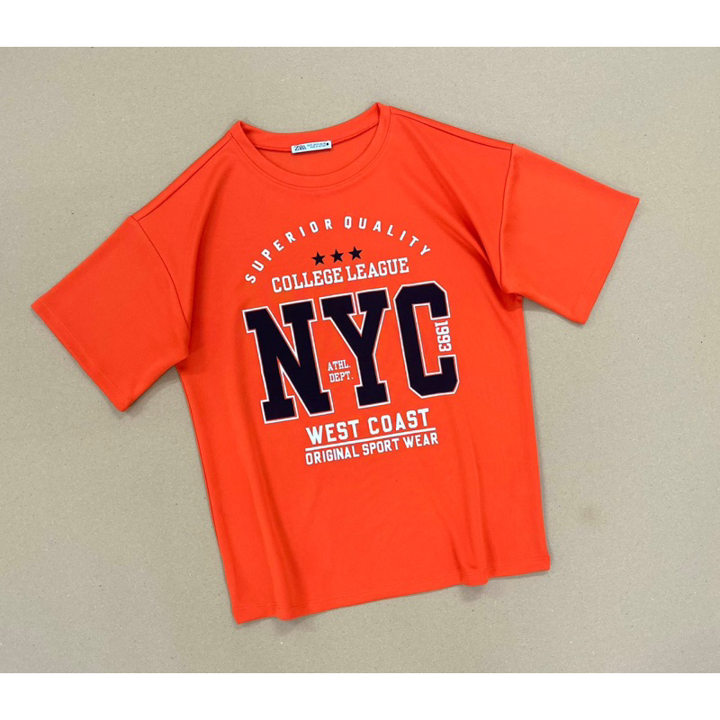 Áo cánh dơi form rộng thun PC cam in NYC
