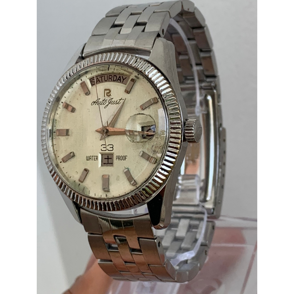 Đồng hồ nam Ricoh automatic, niềng răng cưa, dây kim loại của Nhật
