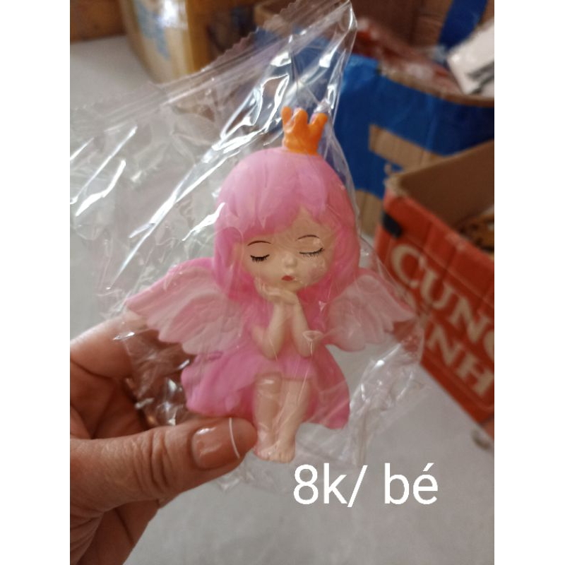 Búp bê vươn miệng hồng