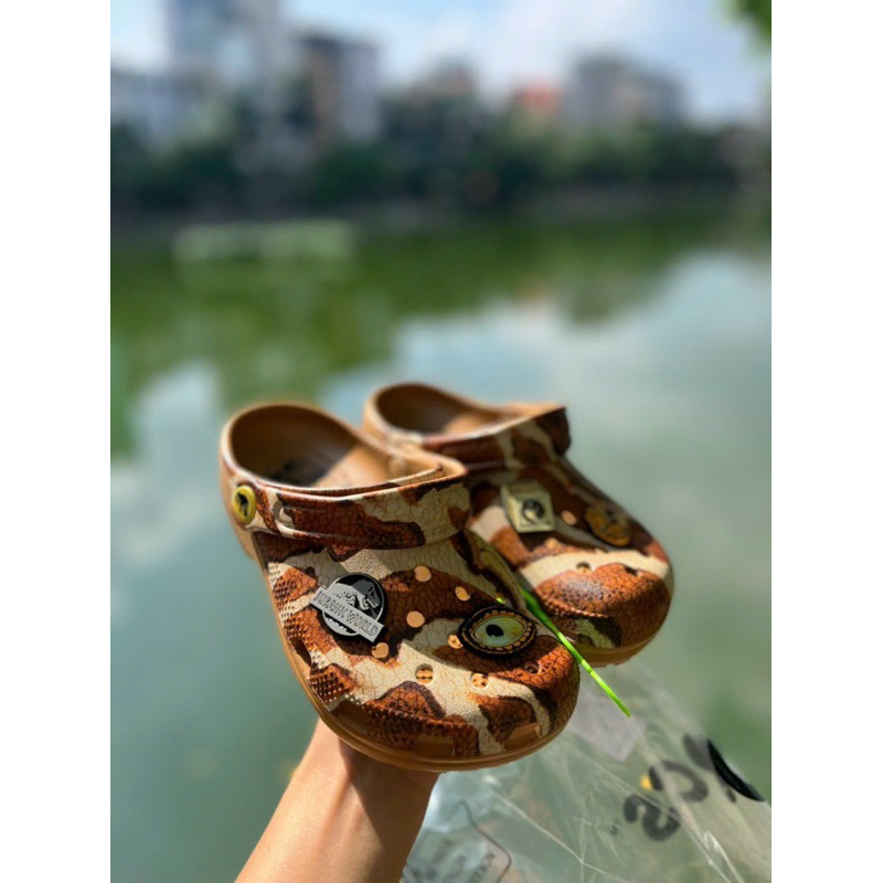 Sục khủng long cho bé tặng sticker như hình