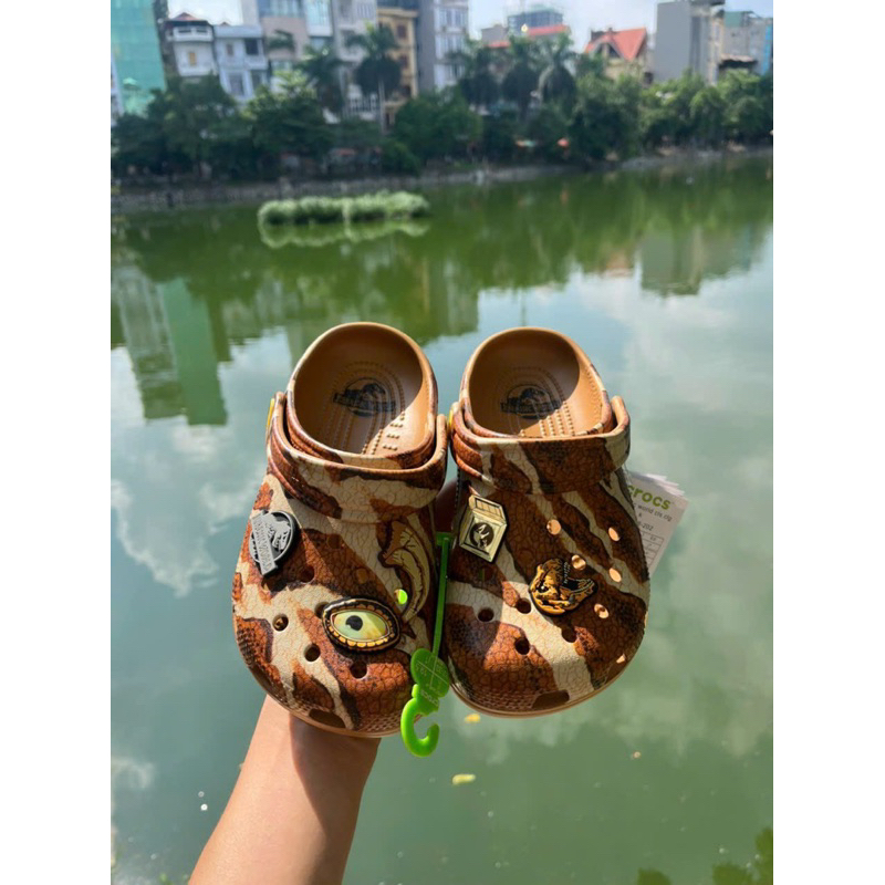 Sục khủng long cho bé tặng sticker như hình