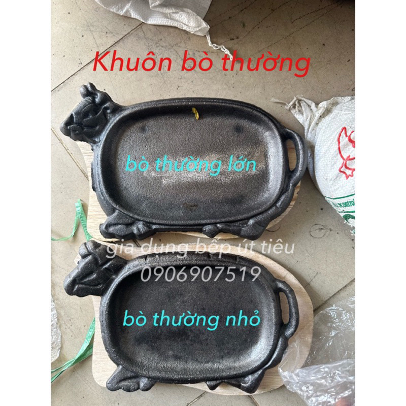 Chảo gang bò né kèm đế gỗ loại thường - chống dính