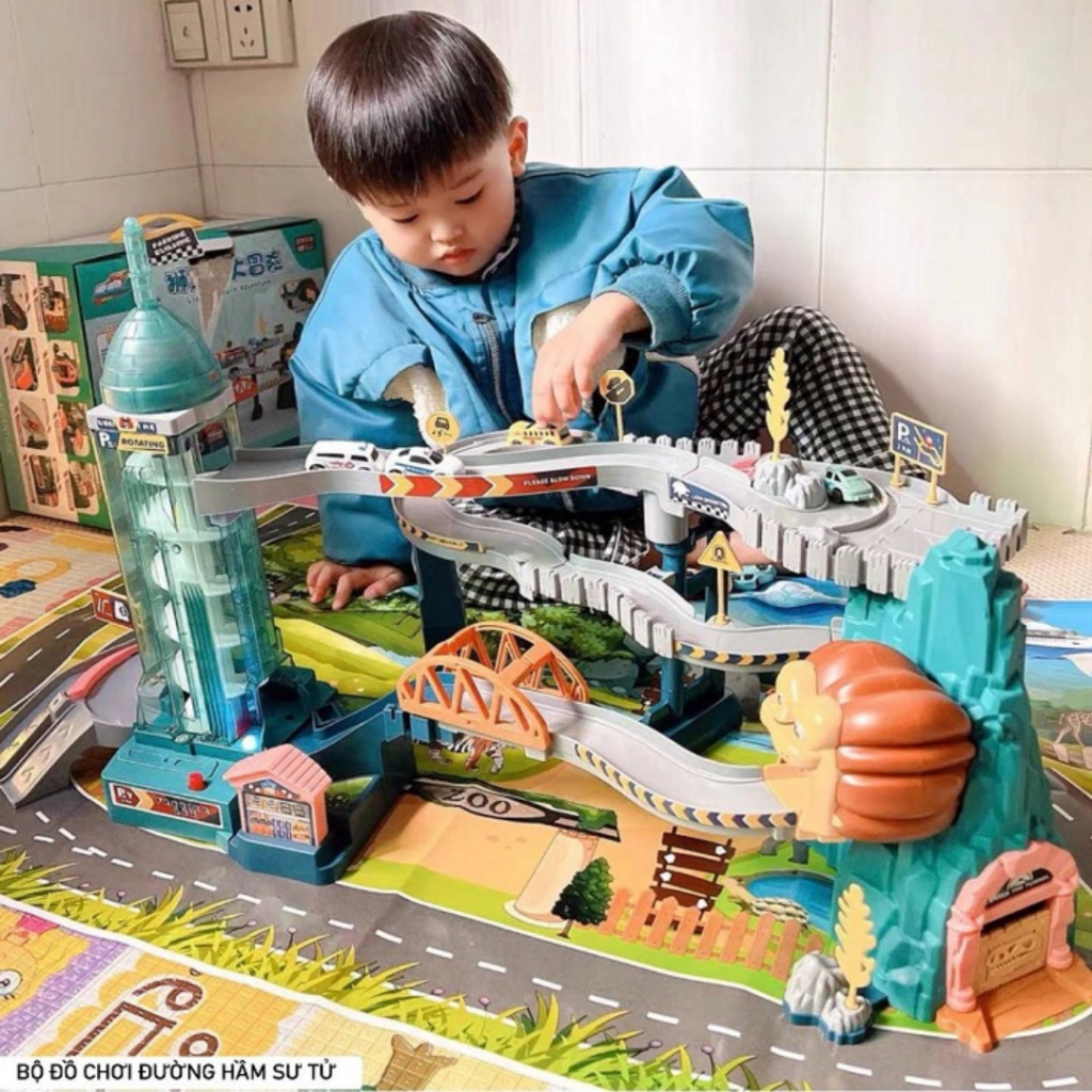 Đường hầm khủng long, bộ đường đua hầm sư tử kèm chạy PIN, có nhạc và LED phát sáng