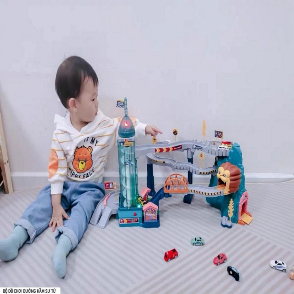 Đường hầm khủng long, bộ đường đua hầm sư tử kèm chạy PIN, có nhạc và LED phát sáng