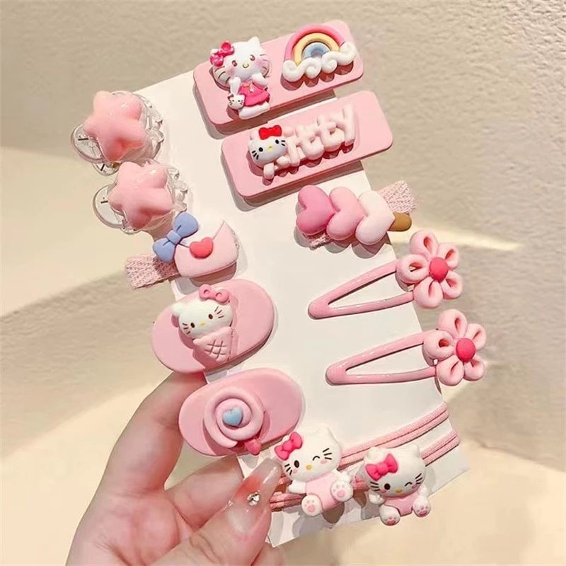 Vĩ 12 kẹp mái kèm cột tóc hoạt hình siêu dễ thương bé nào cũng mê.