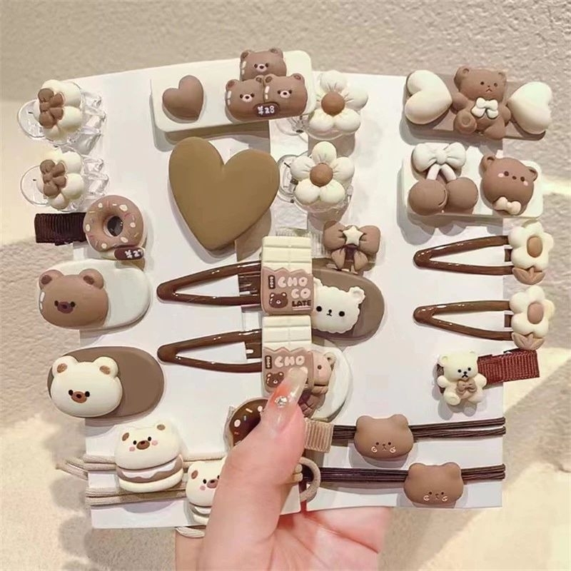 Vĩ 12 kẹp mái kèm cột tóc hoạt hình siêu dễ thương bé nào cũng mê.