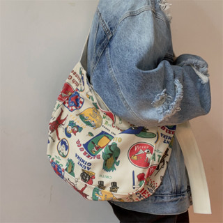 Túi đeo chéo đi học túi đeo vai canvas họa tiết có khóa bấm miệng đựng laptop giấy a4 thời trang DC10