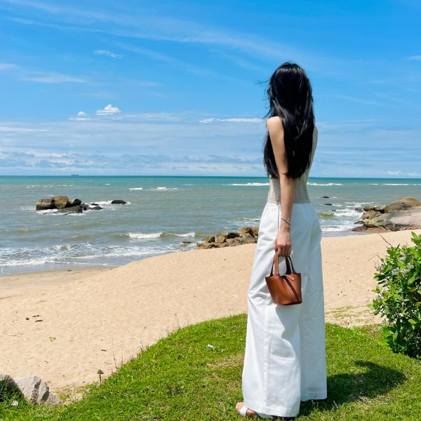 Túi xách nữ cầm tay dáng túi Bucket màu nâu da bò