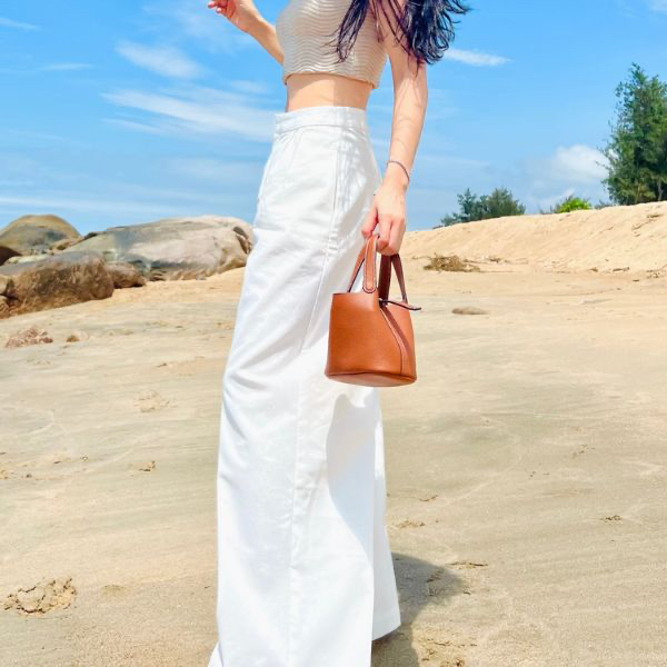 Túi xách nữ cầm tay dáng túi Bucket màu nâu da bò