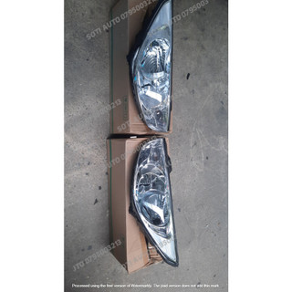 Đèn pha Hyundai Tucson 2011